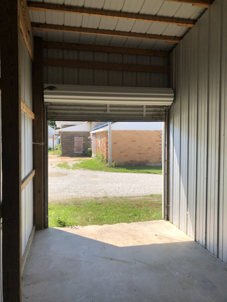 Inside 10' x 19' storage unit with roll-up door