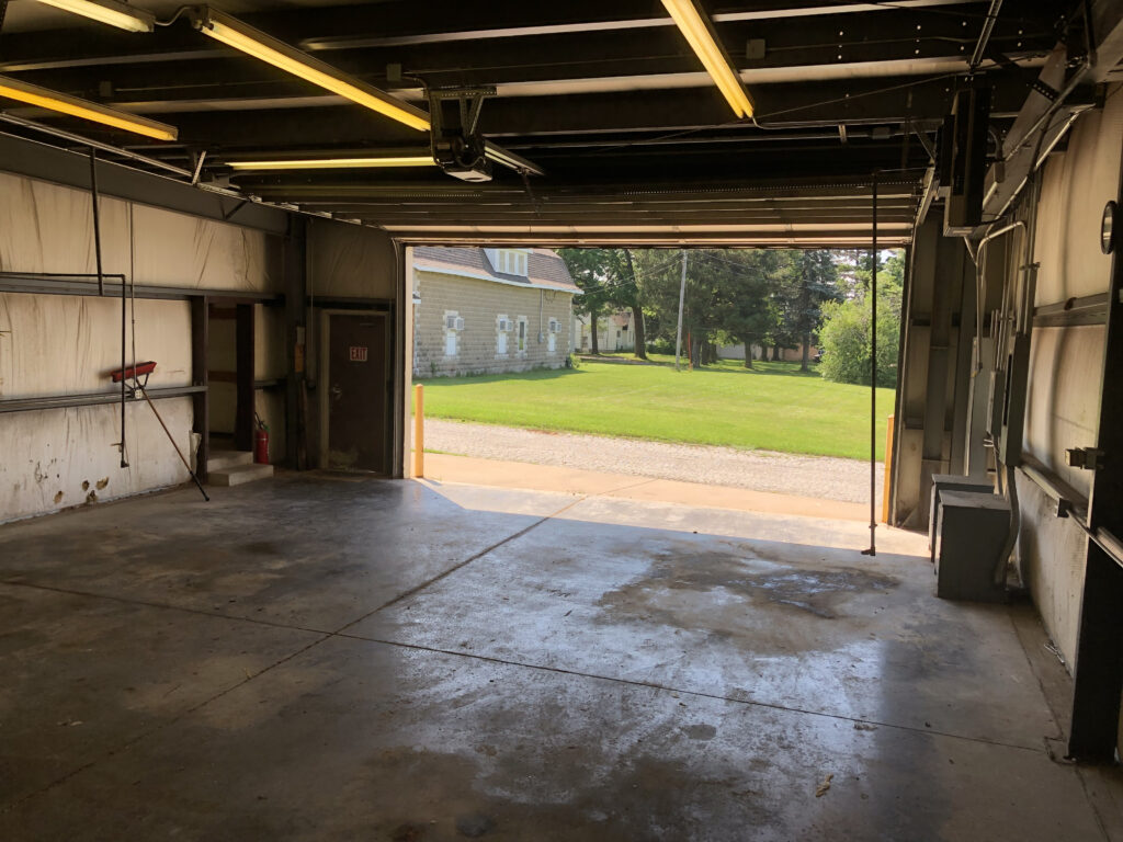 Inside the shop looking out from corner by the road