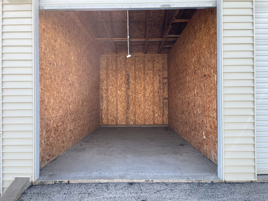 10' x 19' Drive-Up Storage Unit at Red Barn Storage with a 8.8' width x 9' height roll-up door.