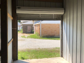 Inside 10' x 19' storage unit with roll-up door