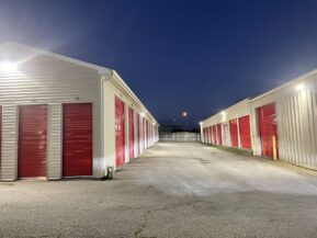 Multiple Storage Units at Red Barn Storage in Davenport, Iowa with lights on