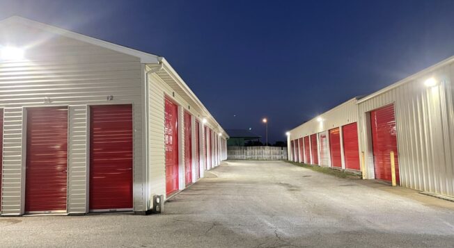 Multiple Storage Units at Red Barn Storage in Davenport, Iowa with lights on